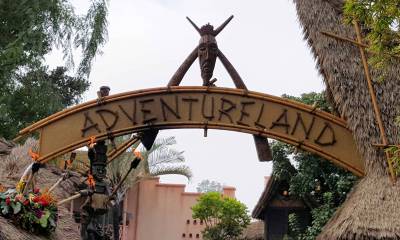 Photo illustrating Disneyland Adventureland sign