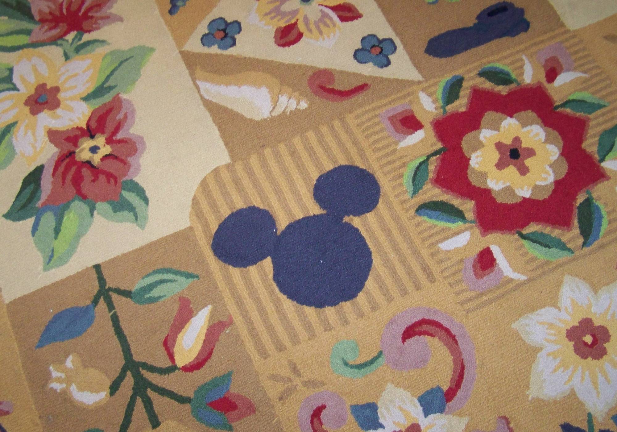 Hidden Mickey in Boardwalk Villas Carpet in Hallway to Rooms.