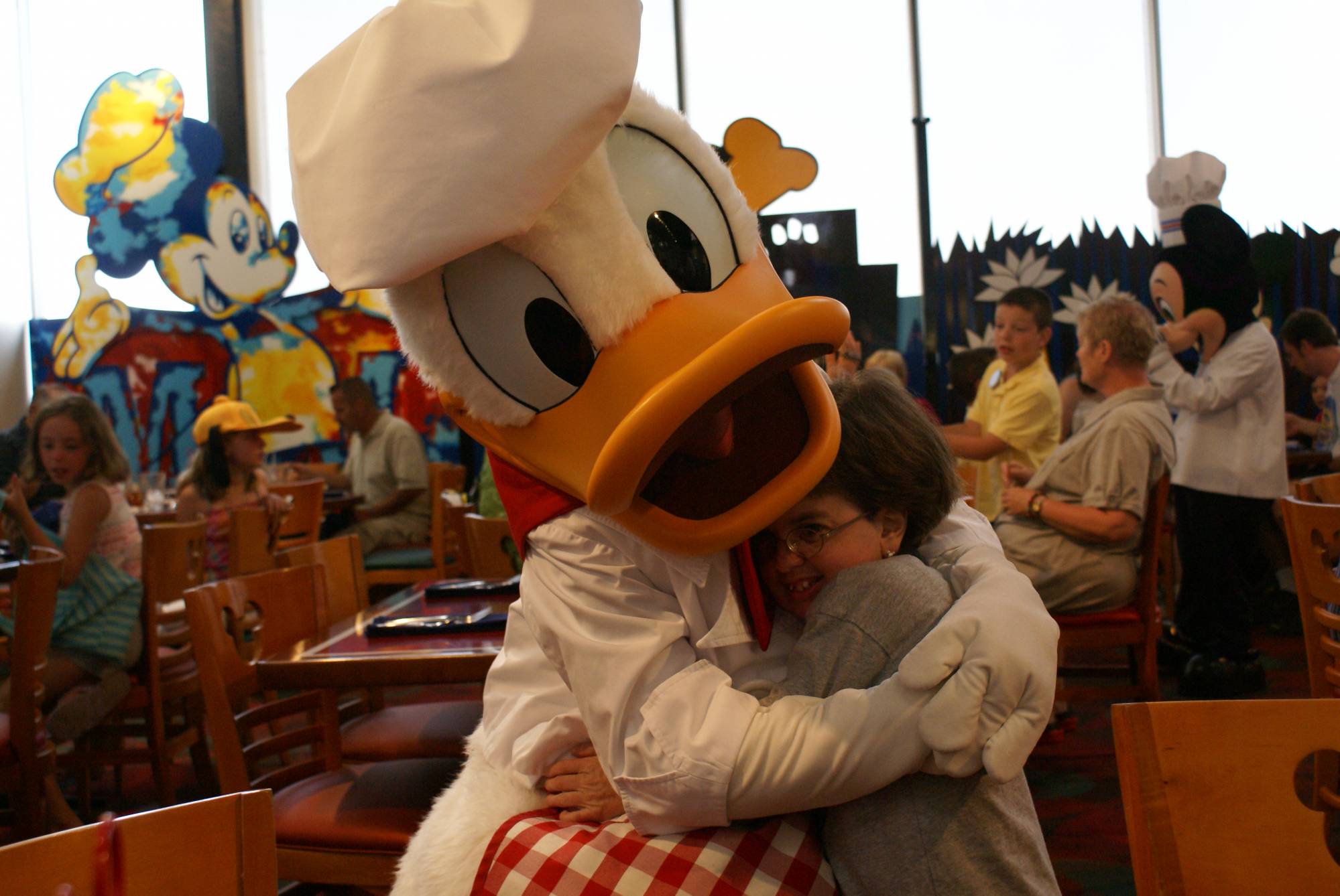 Hugging Donald at Chef Mickey's