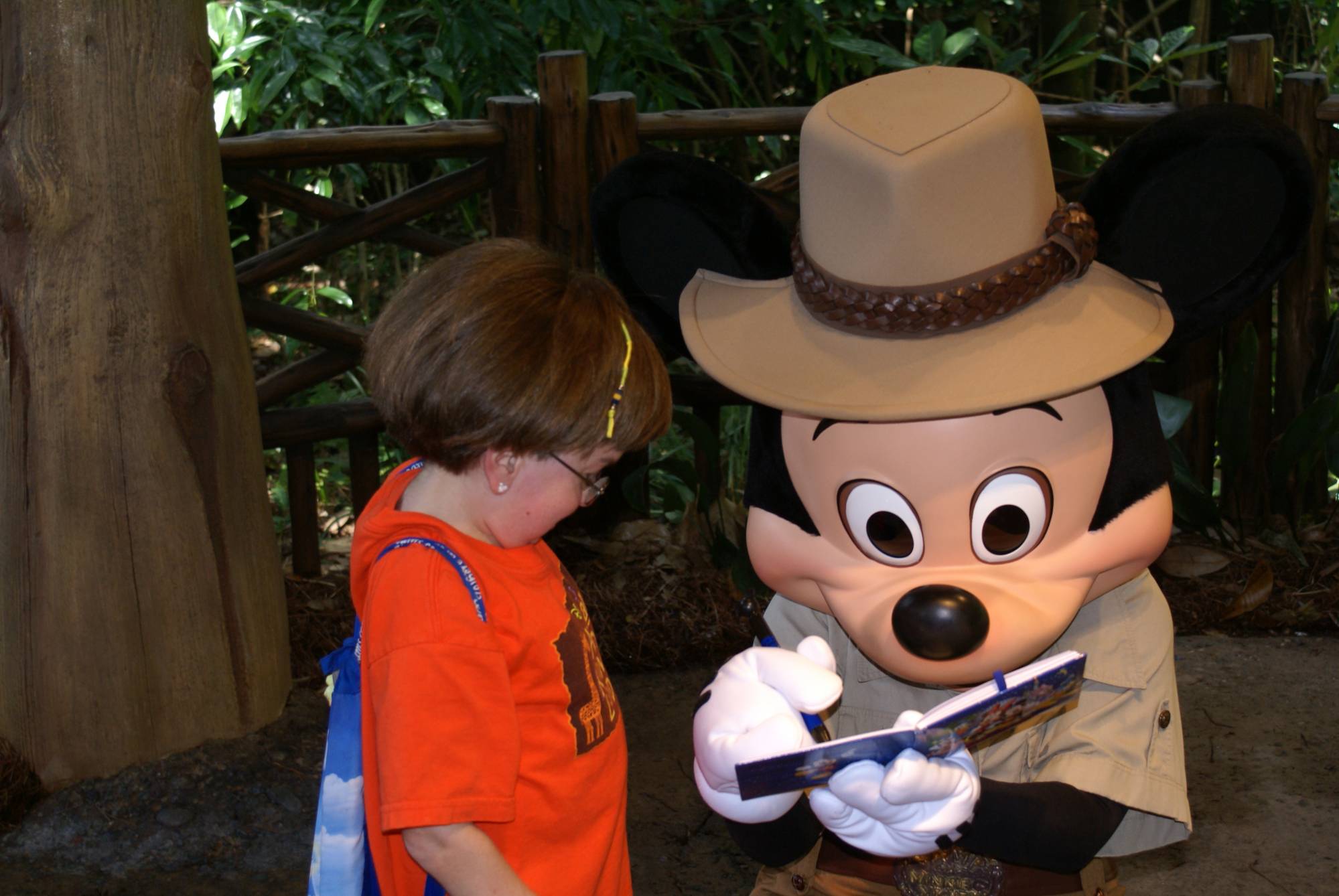 Mickey Signs His Name