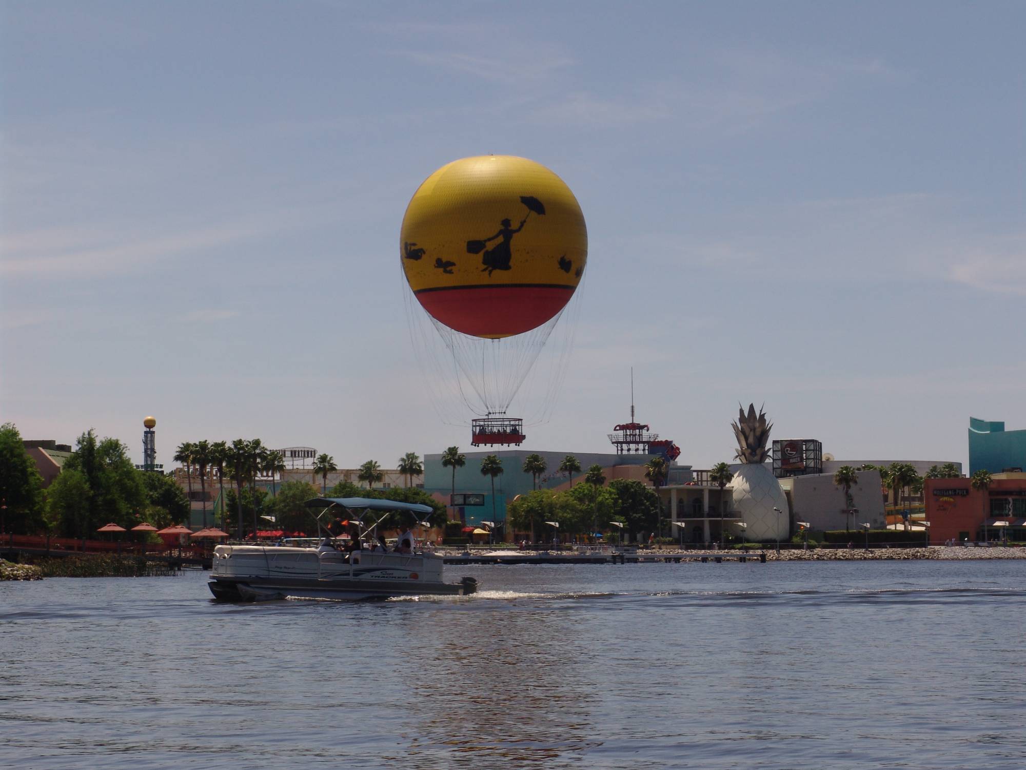 Downtown Disney - Characters in Flight over lake