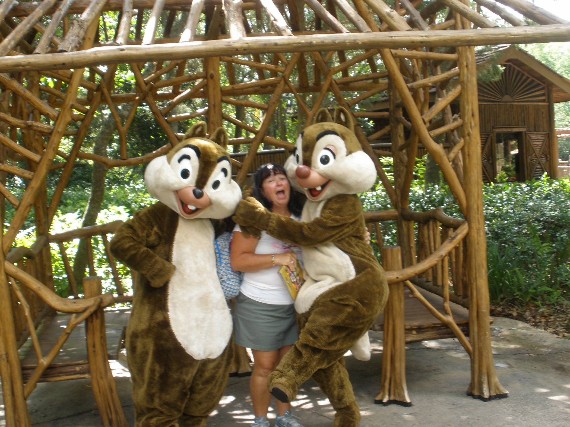 Chip and Dale having fun with Ann at Camp MIckey and Minnie