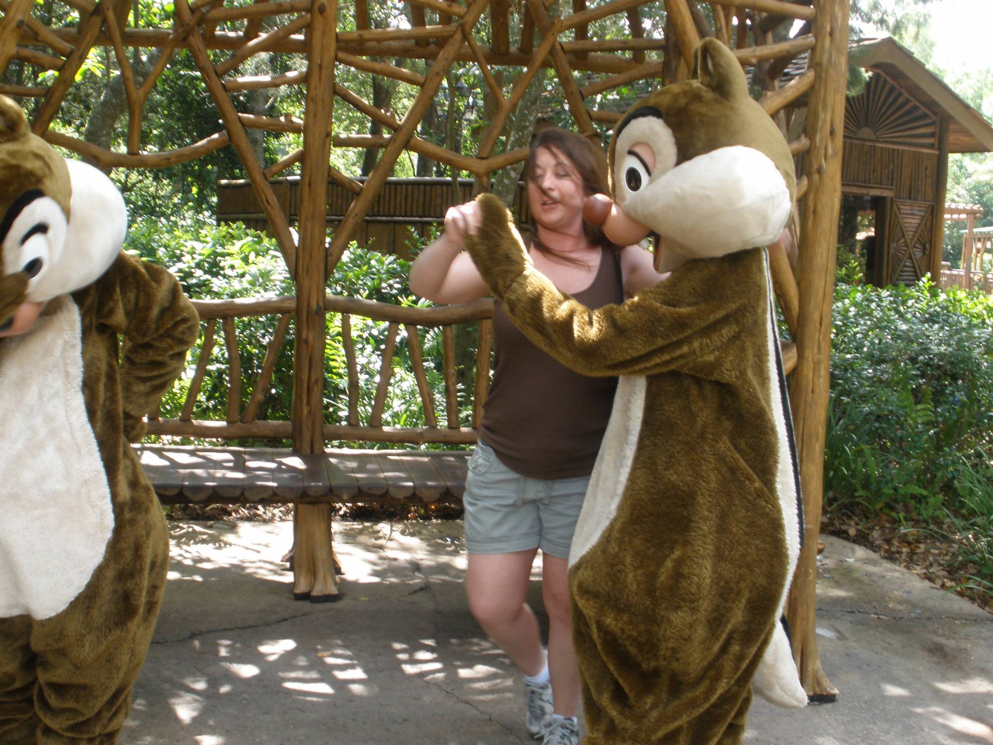 Carly dancing with Chip and Dale at Camp Mickey and Minnie
