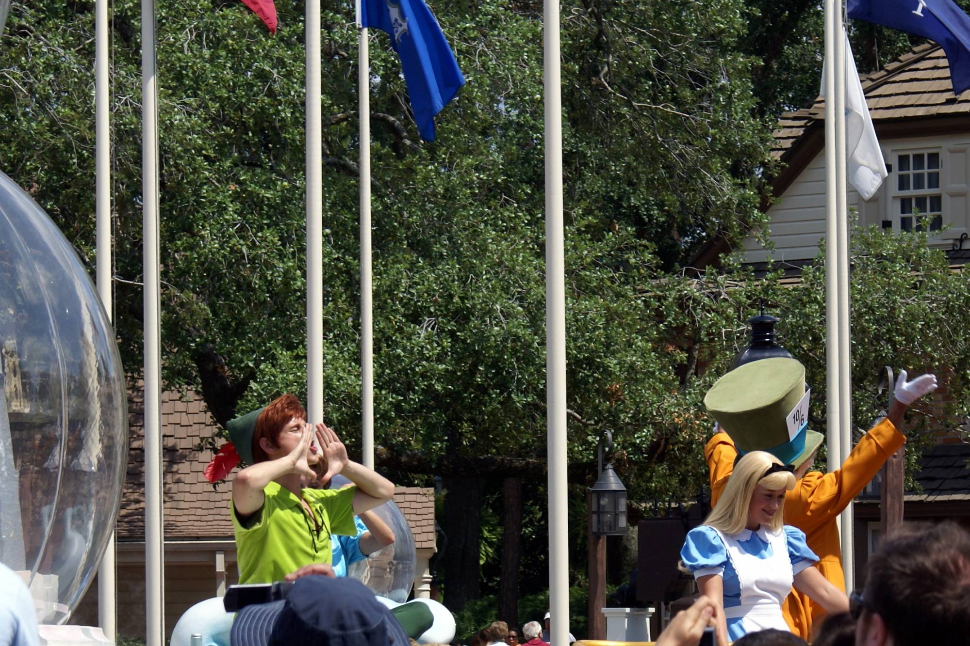 Celebrate a Dream Come True Parade Peter Pan, Mad Hatter, and Alice