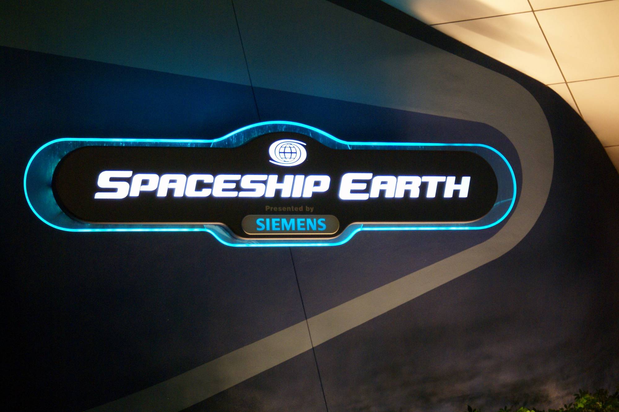 Spaceship Earth Sign Lit at Night