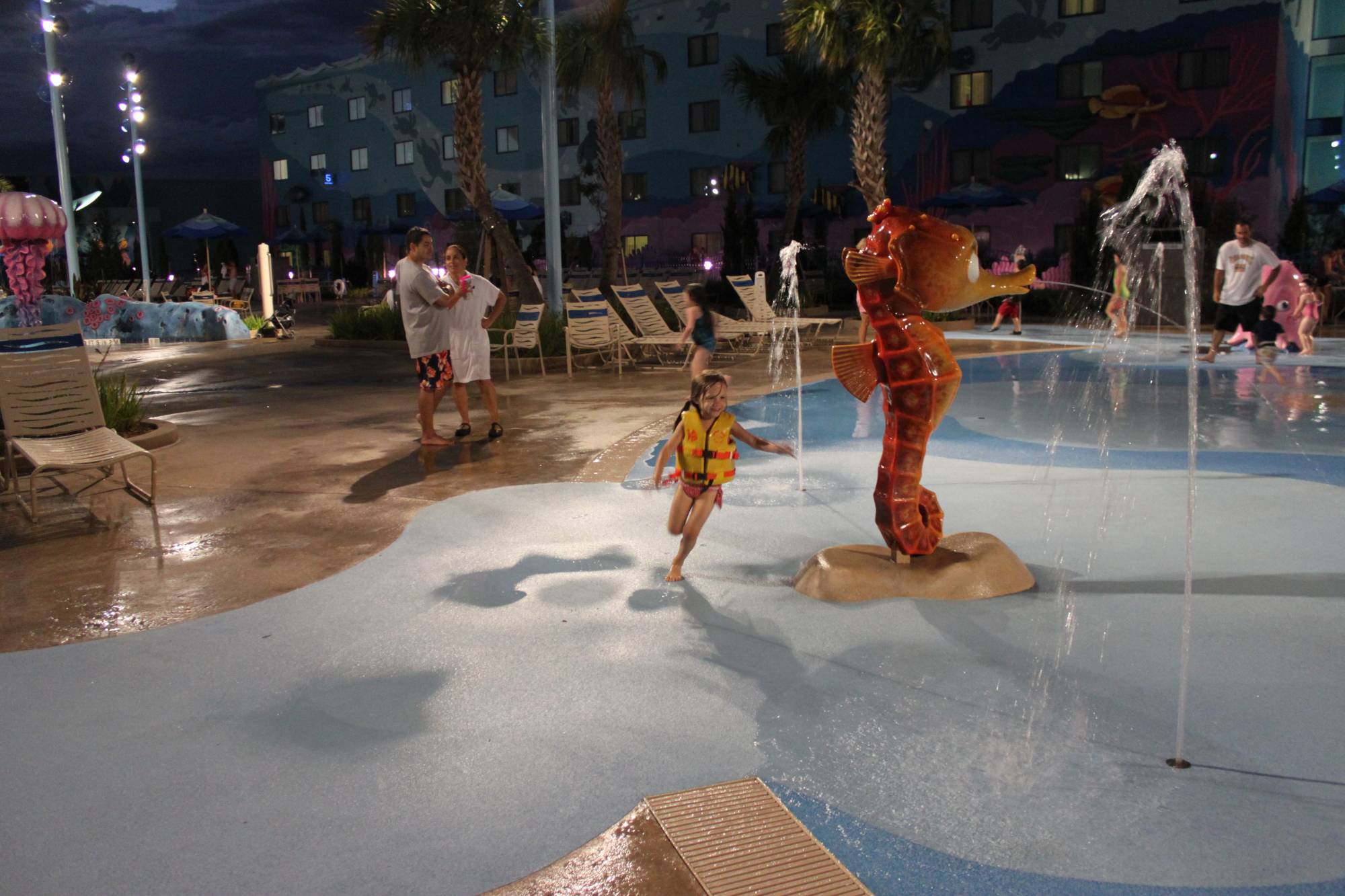 Art of Animation Main Nemo Pool and Splash Pad Area at Night