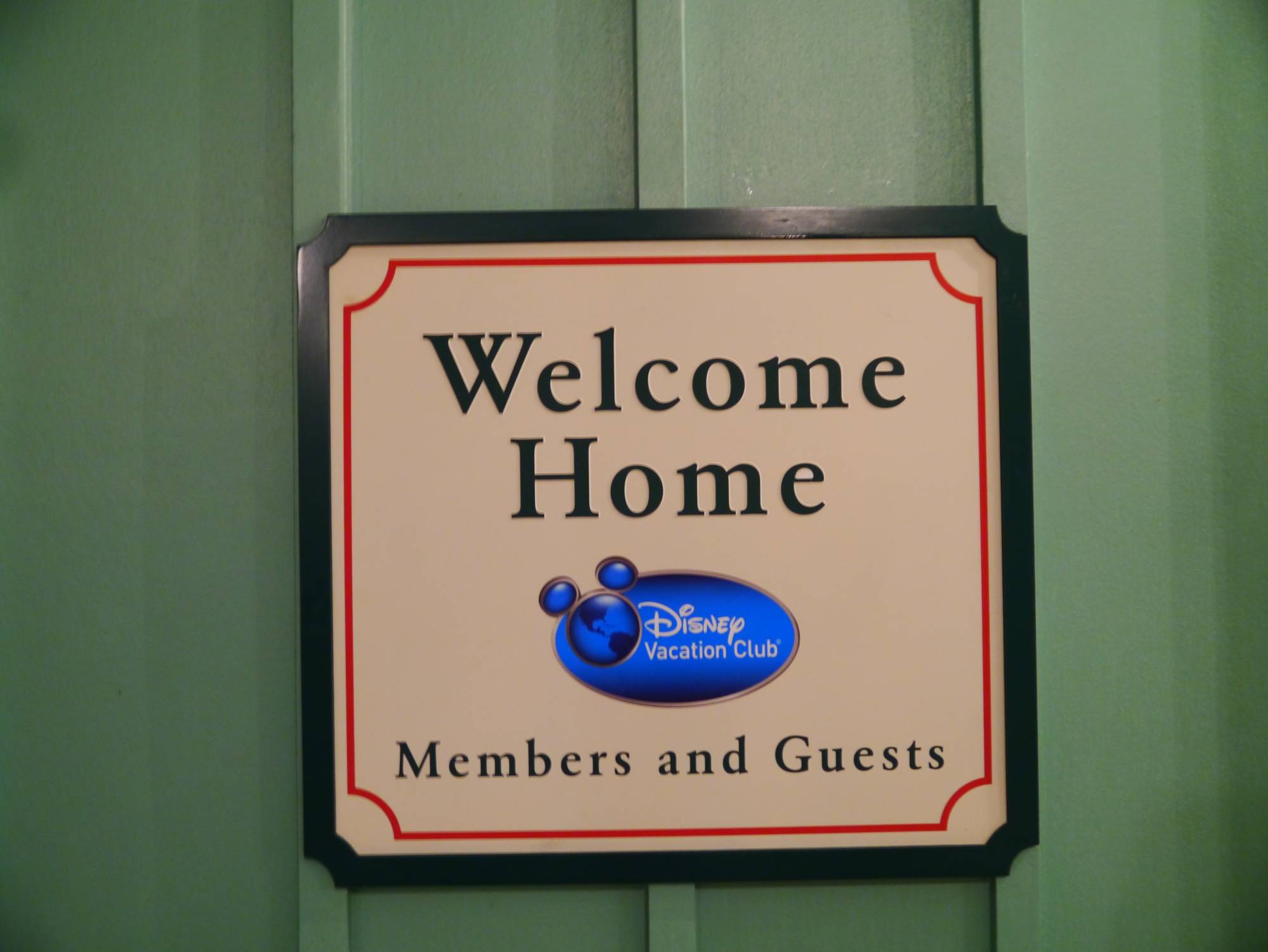 Beach Club Villas - Welcome Home sign
