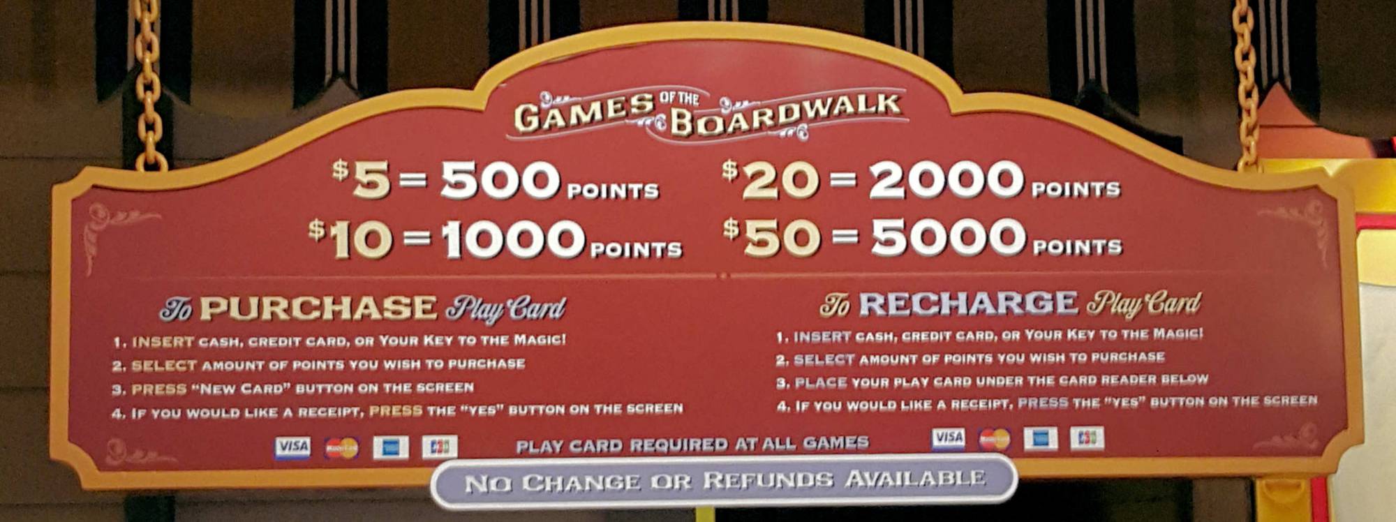California Adventure Paradise Pier Boardwalk games sign and card machine